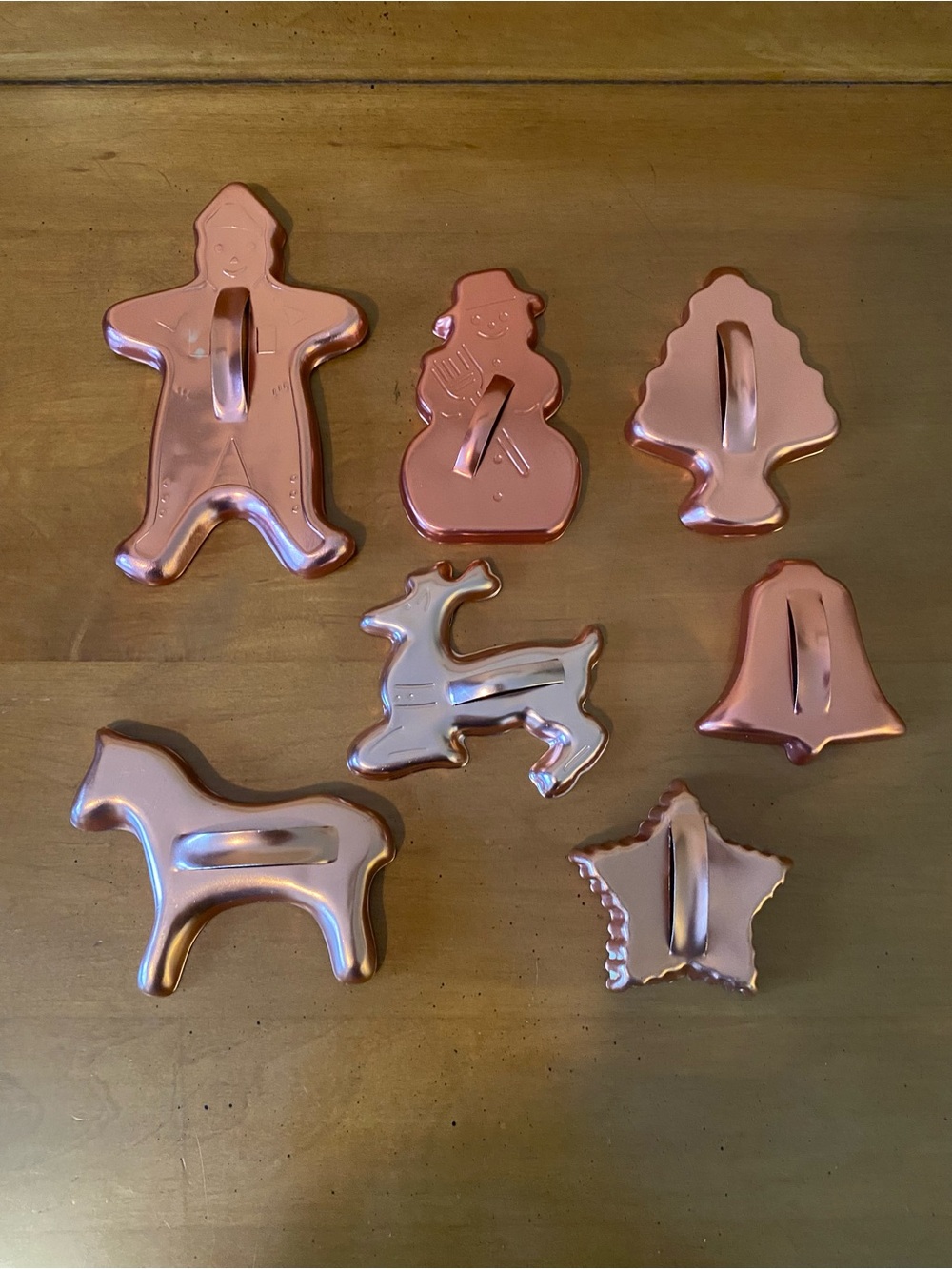 Cookie Cutters 7 piece copper colored Gingerbread Man Snowman Tree Reindeer etc